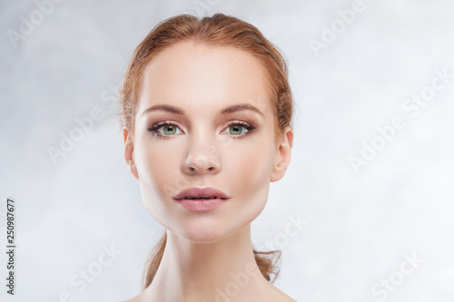Redhead girl beauty portrait, skin care concept.