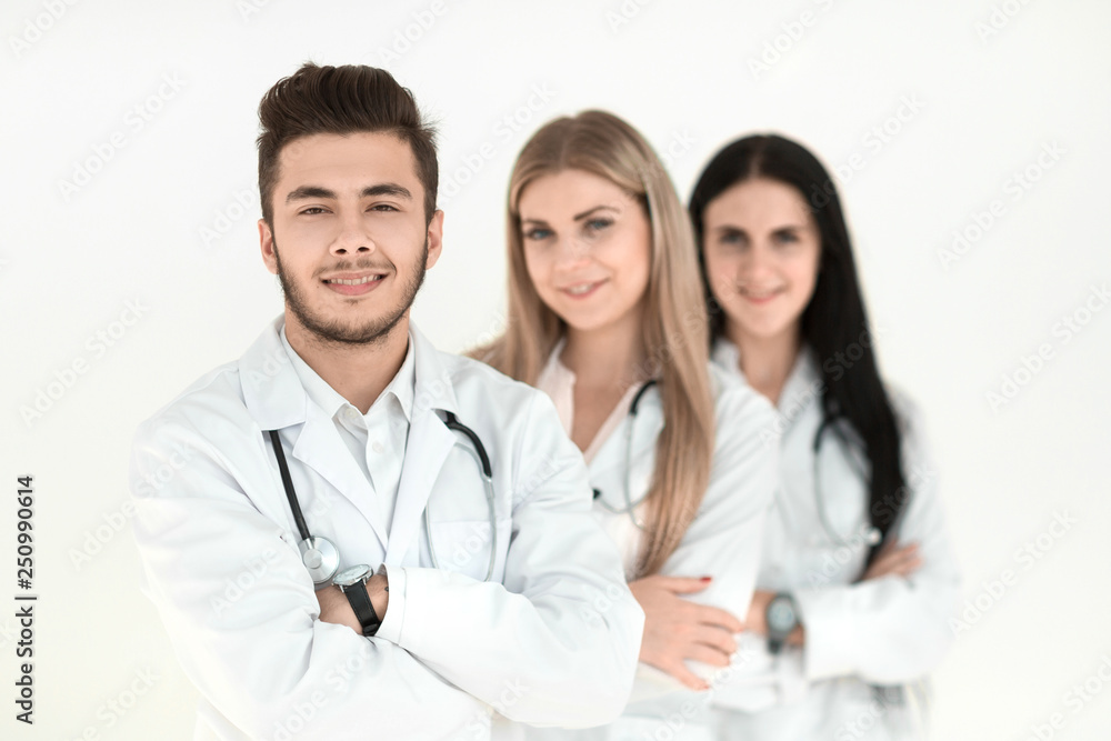 group of smiling hospital colleagues standing together group of smiling hospital colleagues standing together