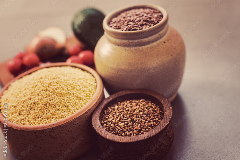 Superfood, groats & seeds, a healthy mix for healthy lifestyle on stone neutral background