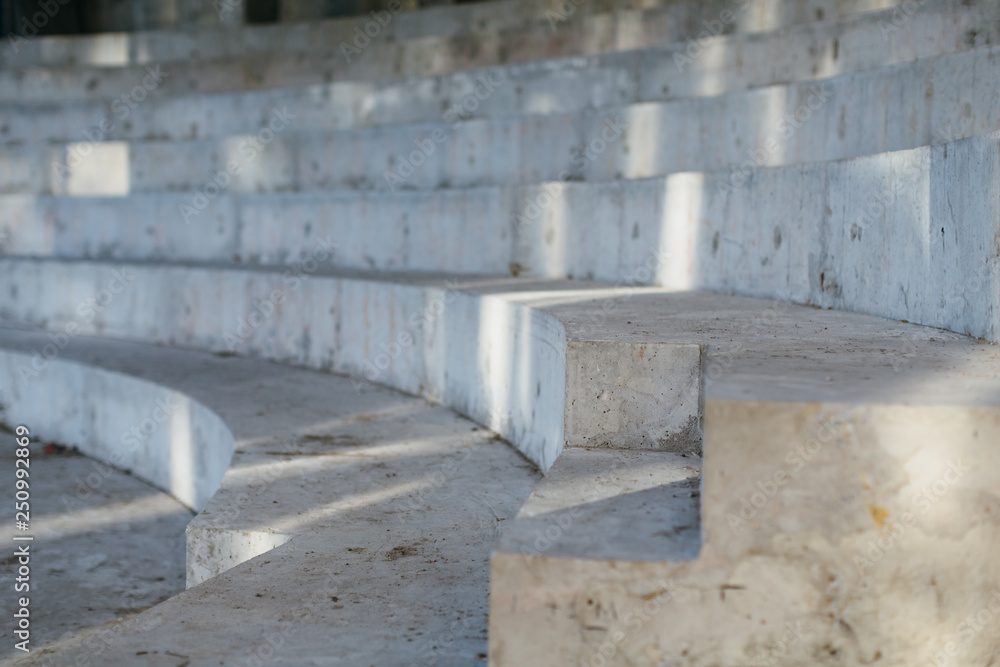 Photo of building under construction, selective focus on in the foreground, amphitheater, scene, platform, theater, construction concept, public place, cultural space, indoor, spectator seats. Photo of building under construction, selective focus on in the foreground, amphitheater, scene, platform, theater, construction concept, public place, cultural space, indoor, spectator seats.