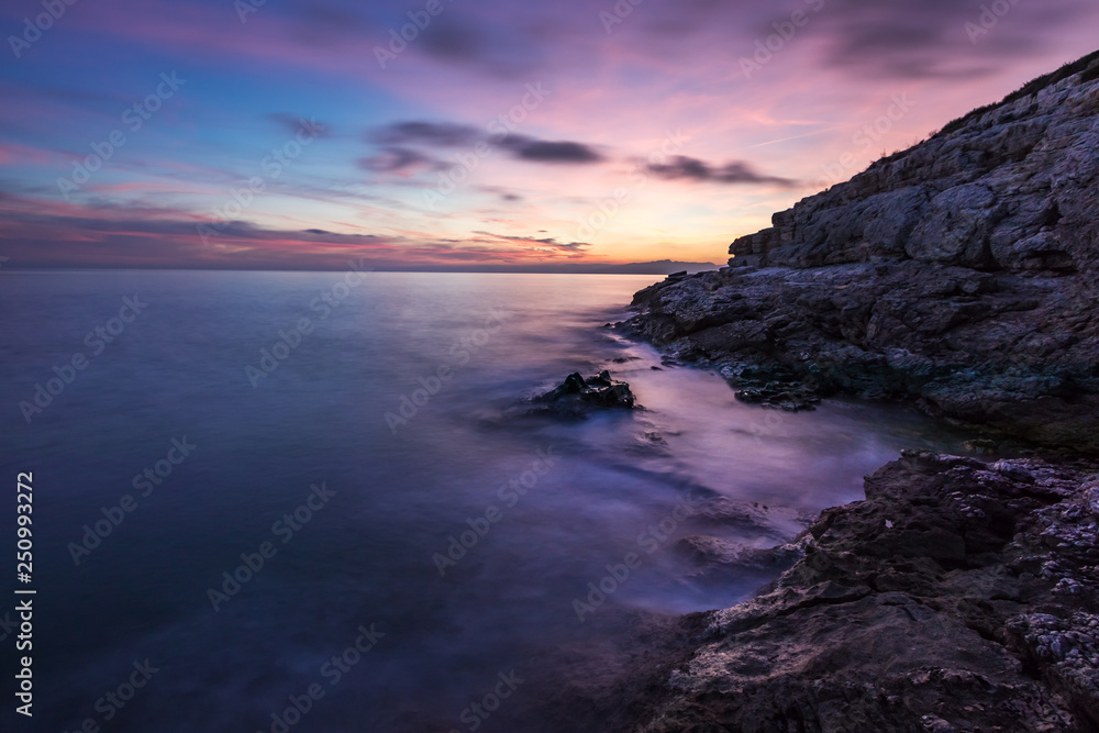 Long exposure on the coast of Salou beach at sunset