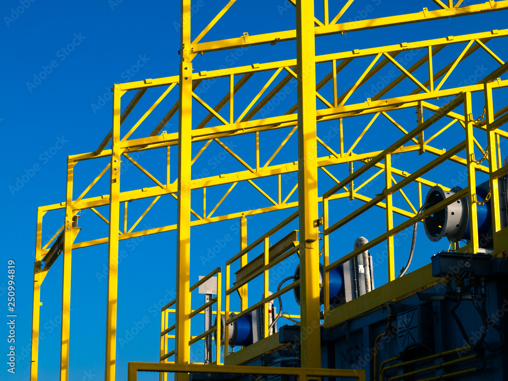 yellow steel construction on sky background yellow steel construction on sky background