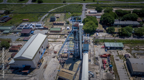 Abandoned mine shaft headgear seen from above on a sunny day