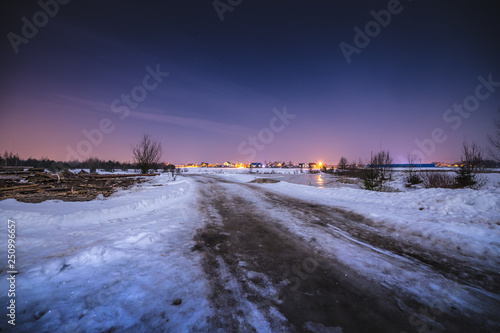 Night landscape of winter road.