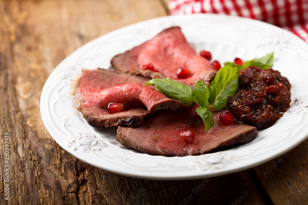 Roast beef with pomegranate sauce