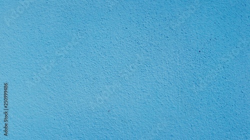 Abstract backgroundlight blue of rough cement.