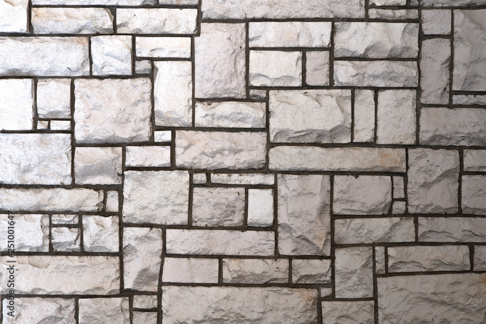 Fototapeta premium パズルのような石の壁