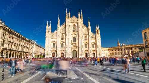 Milan Cathedral Hyperlapse Time lapse. People walking on Square Piazza Duomo di Milano and Gallery Vittorio Emanuele II, during the fashion week timelapse city. photo
