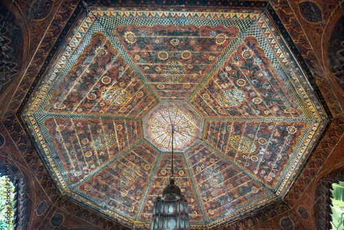 Arabic seamless pattern - traditional Islamic background. Decorative element. Traditional Moroccan pattern tiled ceiling in Dar Si Said Museum in Marrakech  Morocco. 