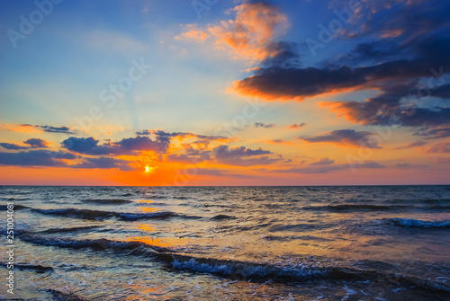 summer sea coast at the dramatic sunset © Yuriy Kulik