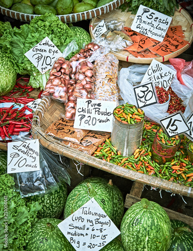 Mixed vegetables, fruits and spices nicely presented with price signage at the Central Market in Baguio City, Benguet Province, Philippines photo