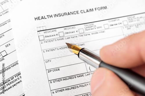 Filing health insurance claim form. Top view.