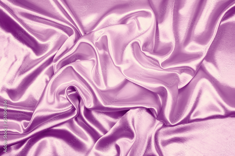 Fototapeta premium Purple luxury satin fabric texture for background