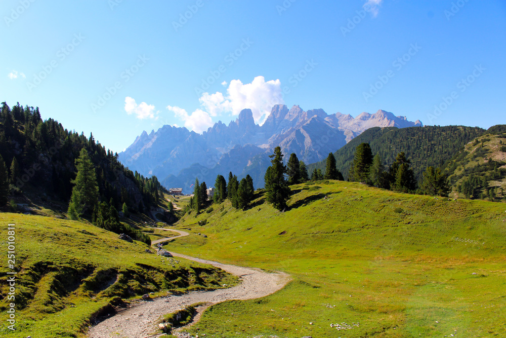 Mountain landscape of the Dolomites, with green pastures and mountain peaks, Dolomites, Italy