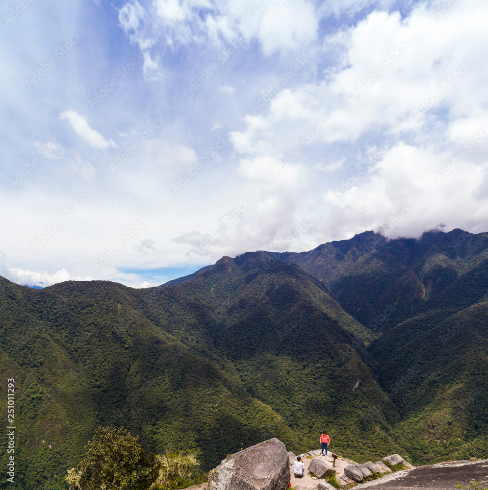 Fototapeta premium panoramic view Machu Picchu, Peru - Ruins of Inca Empire city and Huaynapicchu Mountain, Sacred Valley
