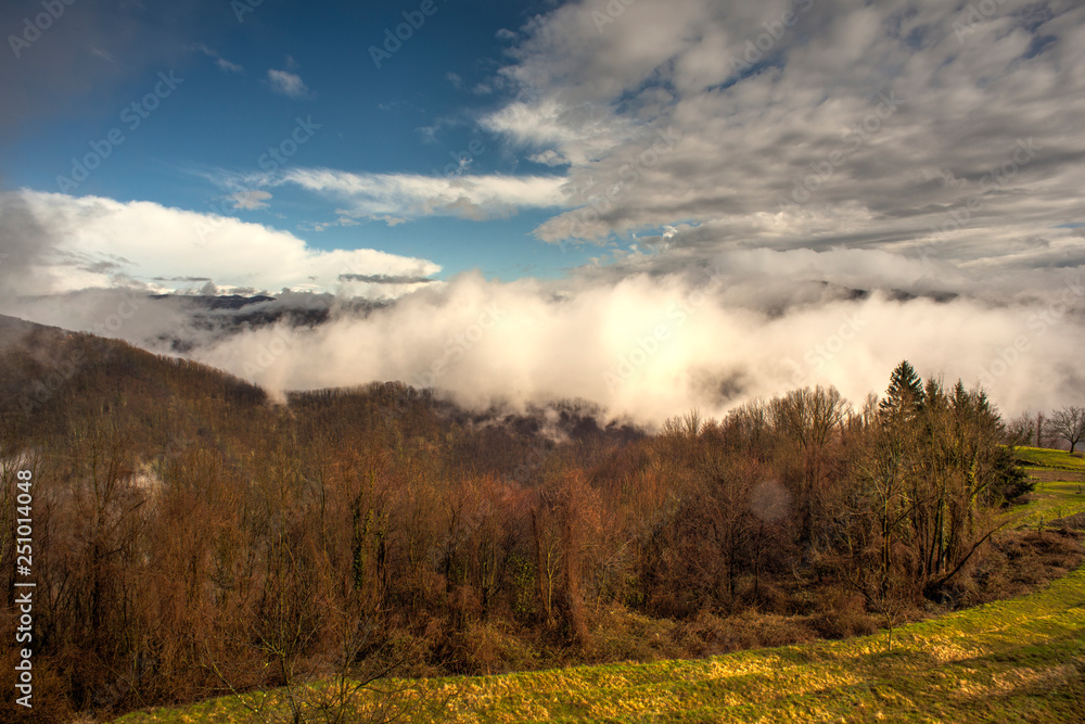 Slovenian mountains covered by fog Slovenian mountains covered by fog