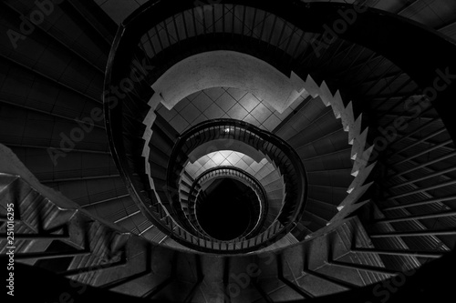 Spiral staircase in an old building,lack and white, monochromatic