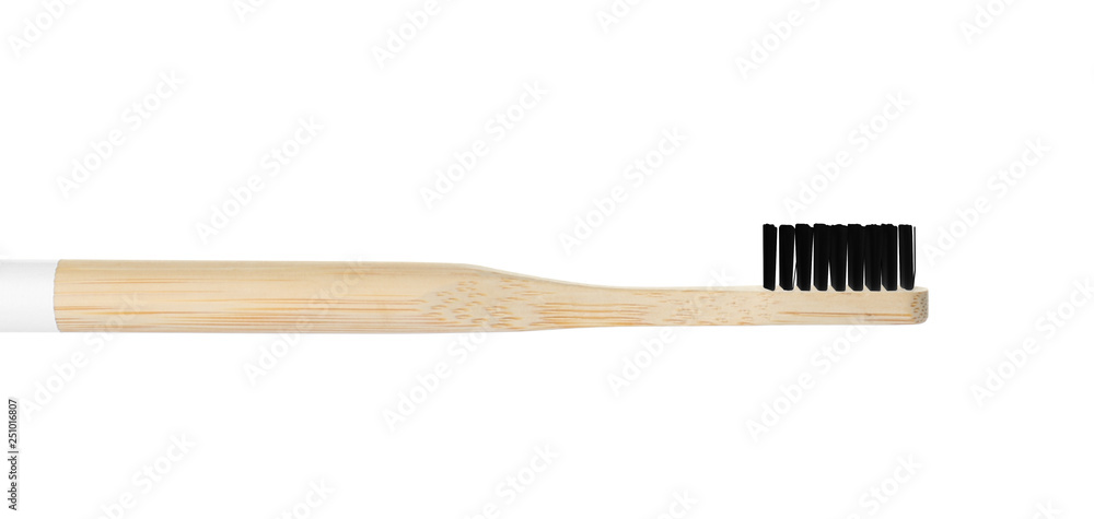 Toothbrush made of bamboo on white background Toothbrush made of bamboo on white background