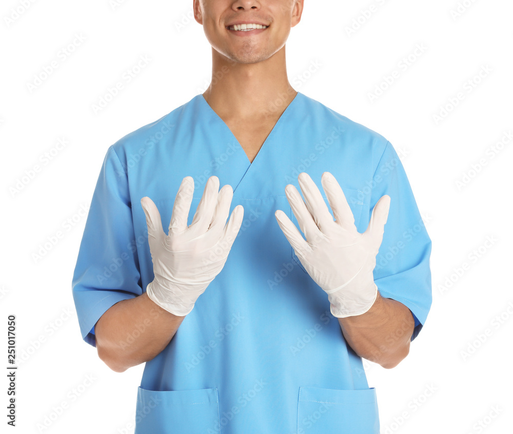 Male doctor in uniform wearing gloves on white background, closeup. Medical object Male doctor in uniform wearing gloves on white background, closeup. Medical object