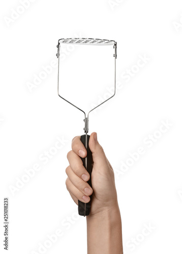Εκτύπωση καμβά Woman holding potato masher on white background. Kitchen utensils