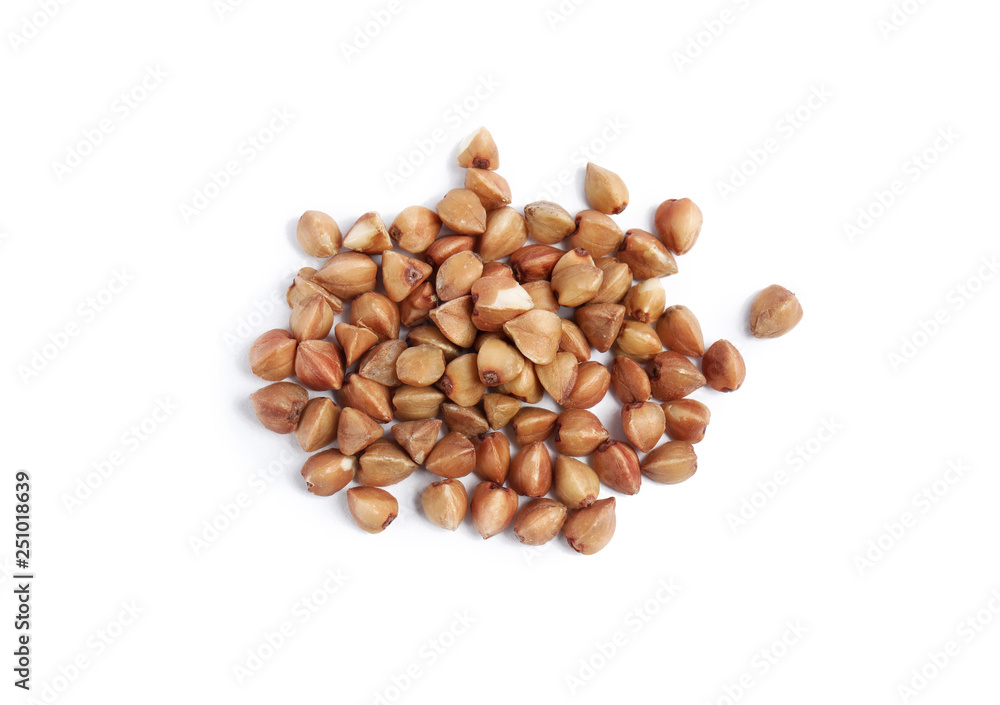 Uncooked buckwheat on white background. Healthy diet Uncooked buckwheat on white background. Healthy diet