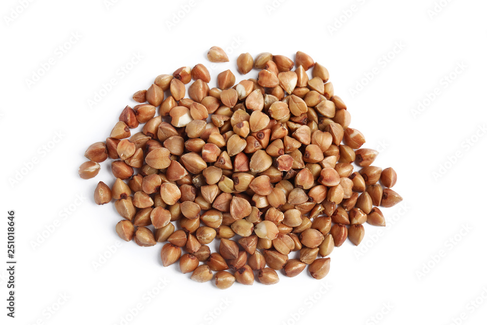 Uncooked buckwheat on white background, top view Uncooked buckwheat on white background, top view