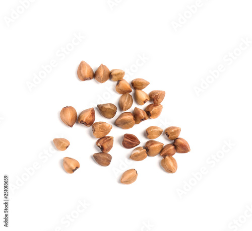 Uncooked buckwheat on white background, top view