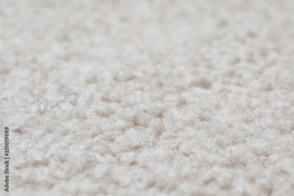 Fuzzy beige carpet texture as background, closeup Fuzzy beige carpet texture as background, closeup