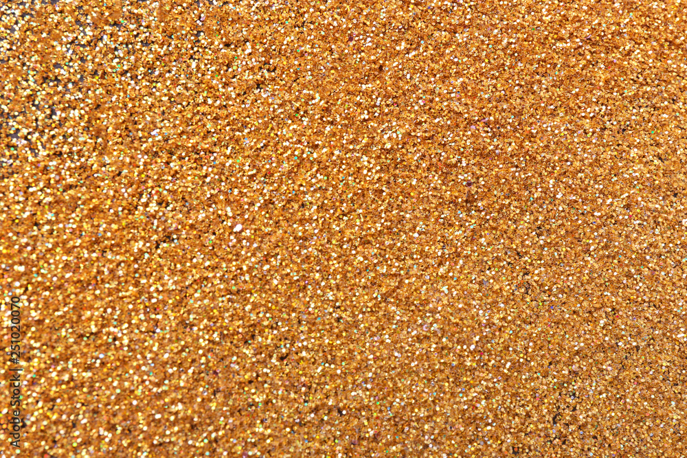 Texture of gold glitter as background, closeup Texture of gold glitter as background, closeup