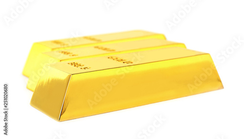 Precious shiny gold bars on white background