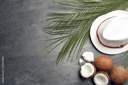 Flat lay composition with coconuts and space for text on grey background