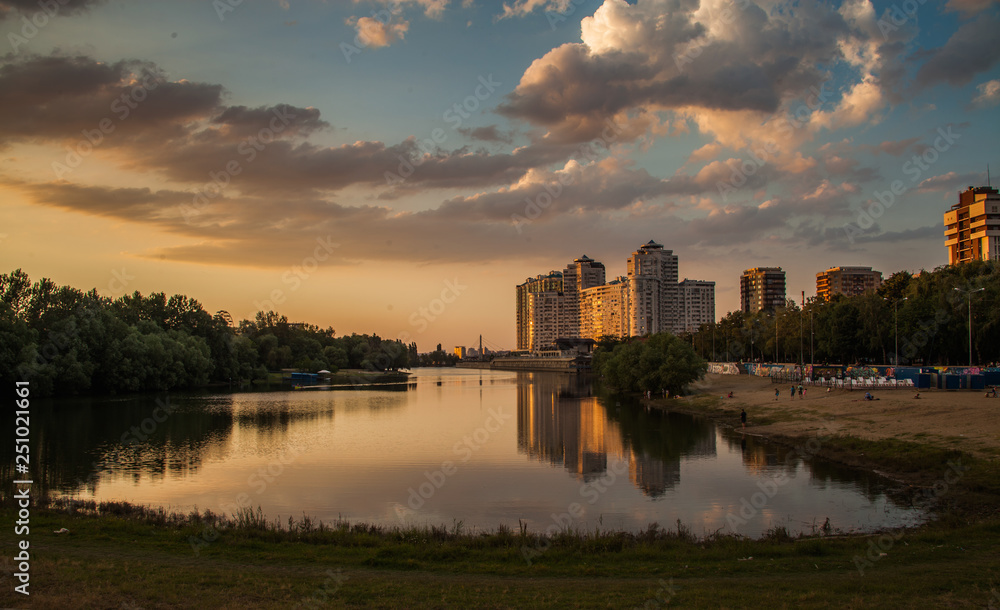 Naklejka premium sunset over the river