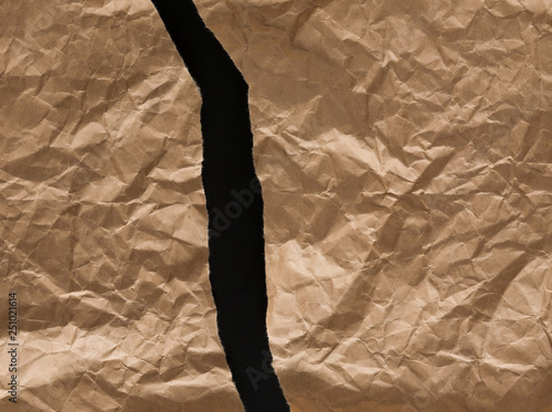 Crumpled and torn craft wrapping paper texture