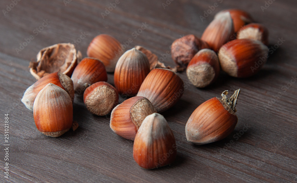 hazelnuts on a wooden background hazelnuts on a wooden background