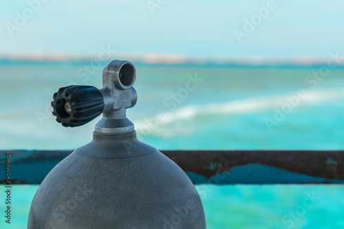 diving cylinder. oxygen cylinder outdoor. Oxygen cylinder for swimming in the background of the sea