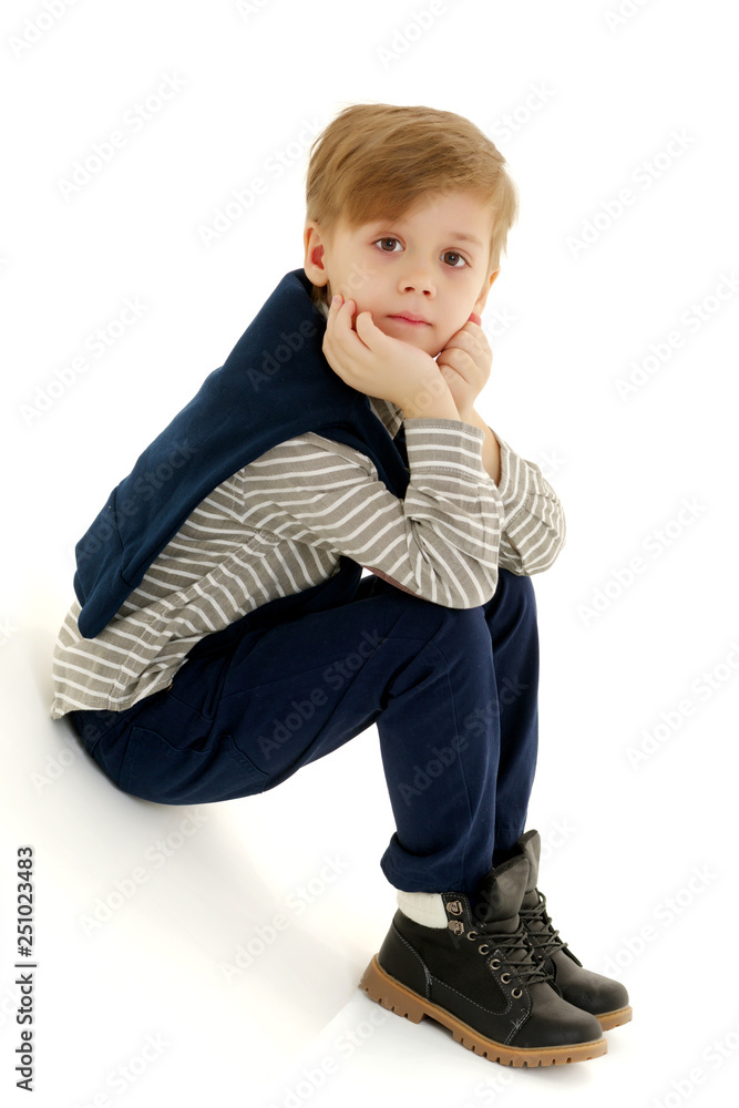 The little boy wondered. The little boy wondered.