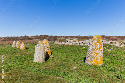 Menhir stones from the bronze age at Archeological site of Tamuli, Sardinia island, Italy photo