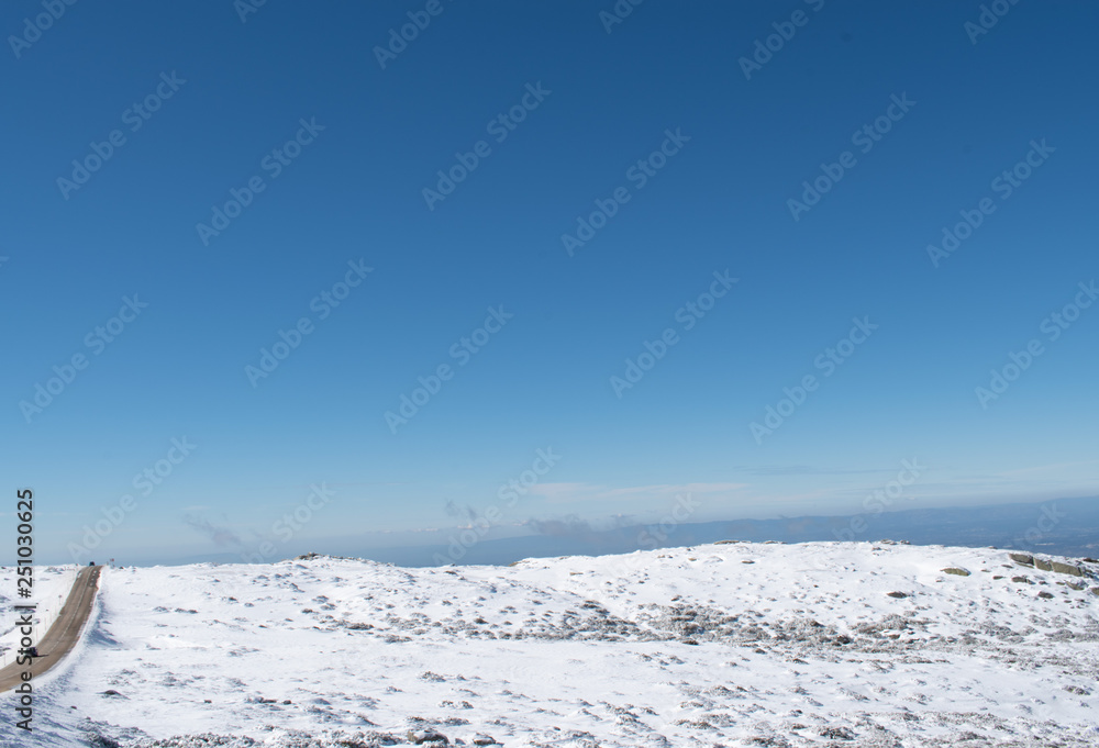 Winter landscape with blue sky and clouds