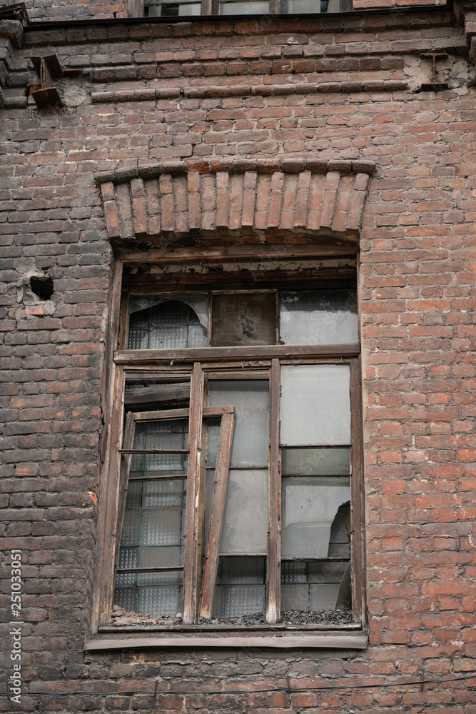 old abandoned town, brick buildings with broken Windows