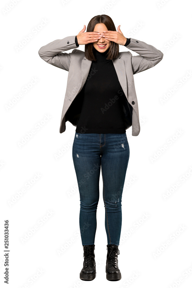 A full-length shot of a Young business woman covering eyes by hands. Surprised to see what is ahead over isolated white background A full-length shot of a Young business woman covering eyes by hands. Surprised to see what is ahead over isolated white background