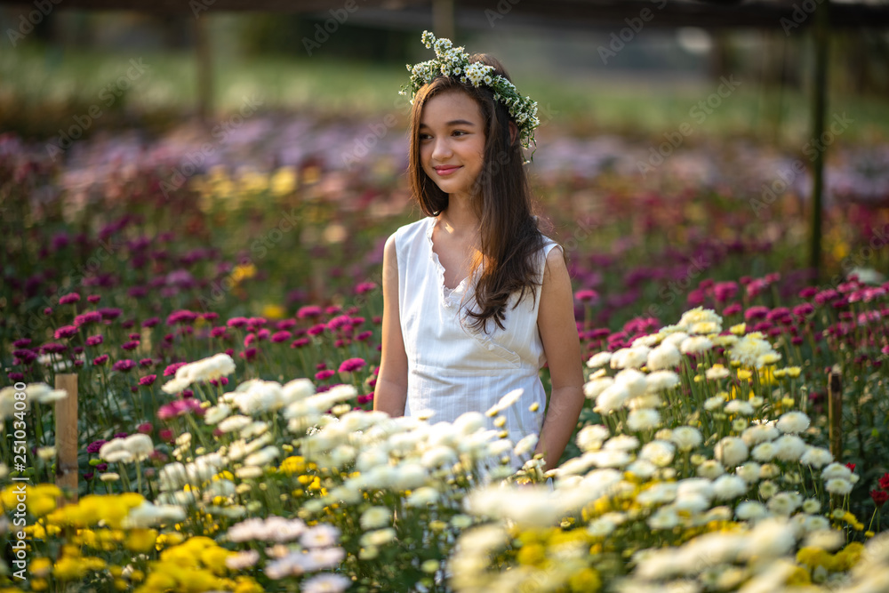 Beautiful girl with flowers field. Beautiful girl with flowers field.