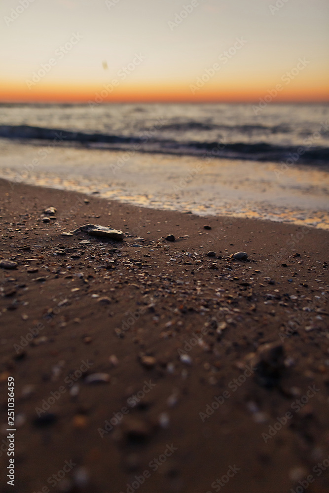 Beautiful view of sunrise in sea. Close Up of waves and beach at sea and colorful sky during sun rise, atmospheric moment. Sunset, dusk or dawn horizon in ocean. Summer vacation on tropical island Beautiful view of sunrise in sea. Close Up of waves and beach at sea and colorful sky during sun rise, atmospheric moment. Sunset, dusk or dawn horizon in ocean. Summer vacation on tropical island