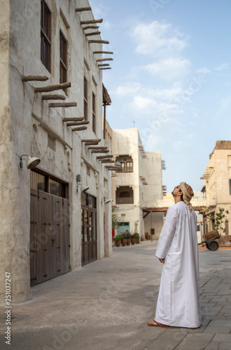 Arab Man in old Al Seef area of Dubia, United Arab Emirates © katiekk2