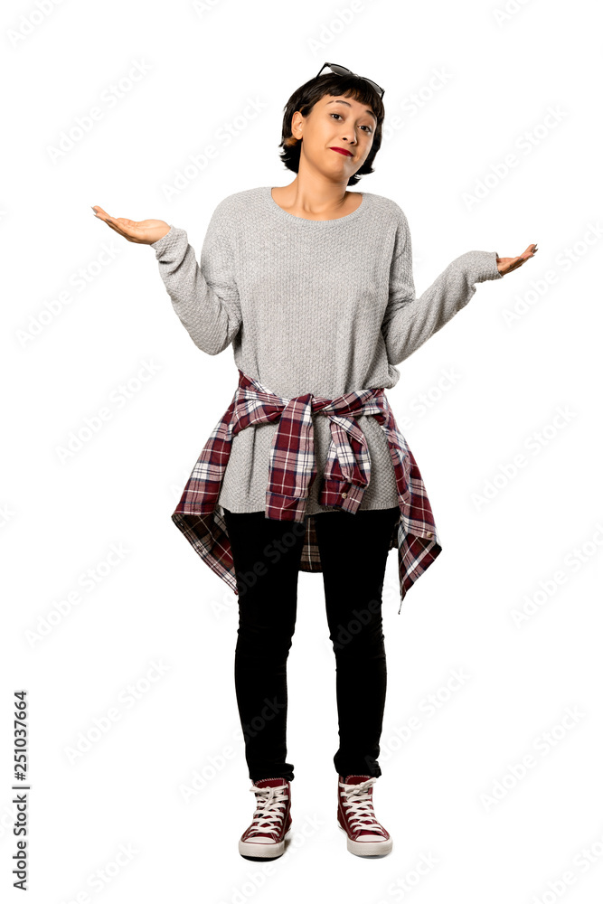 A full-length shot of a Young woman with short hair unhappy because not understand something over isolated white background A full-length shot of a Young woman with short hair unhappy because not understand something over isolated white background