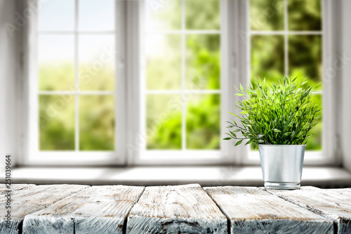 Desk of free space and spring window background 