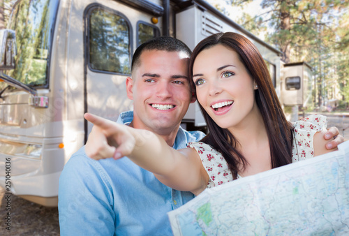 Young Military Couple Looki...