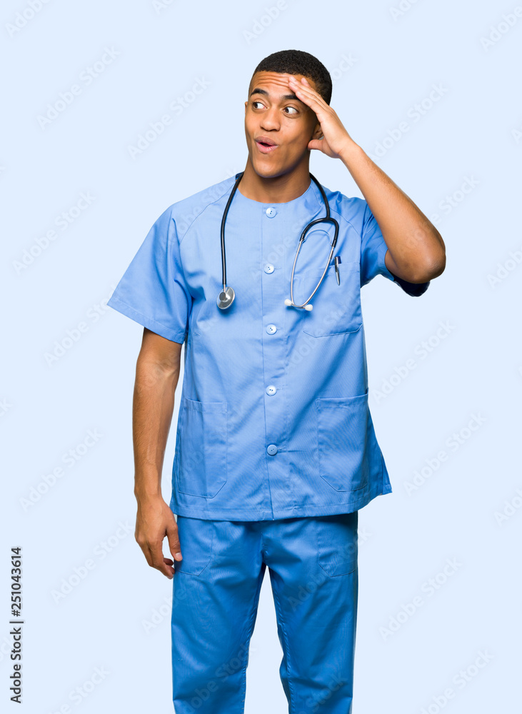 Surgeon doctor man has just realized something and has intending the solution on isolated background Surgeon doctor man has just realized something and has intending the solution on isolated background