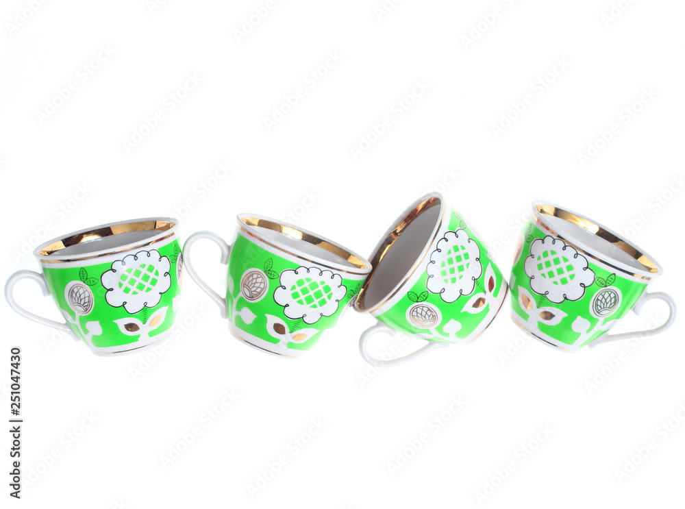Set of retro ceramic cups with patterns isolated on white background.