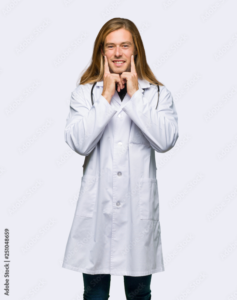Doctor man smiling with a happy and pleasant expression on isolated background Doctor man smiling with a happy and pleasant expression on isolated background
