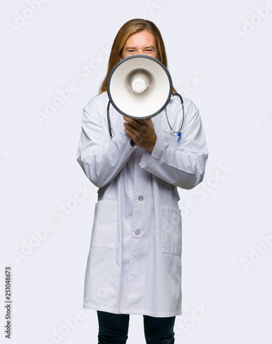 Doctor man shouting through a megaphone to announce something on isolated background